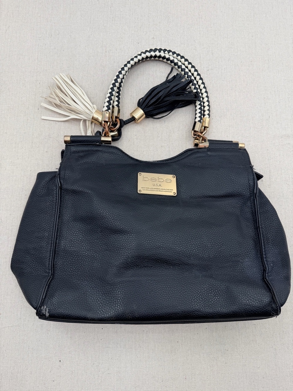 bebe Black Satchel with Braided Two-Tone Handles and Tassels